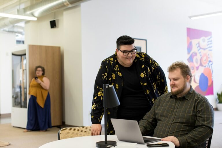 man using laptop on desk